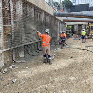 spraying concrete wall