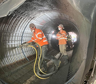 spraying concrete tunnel
